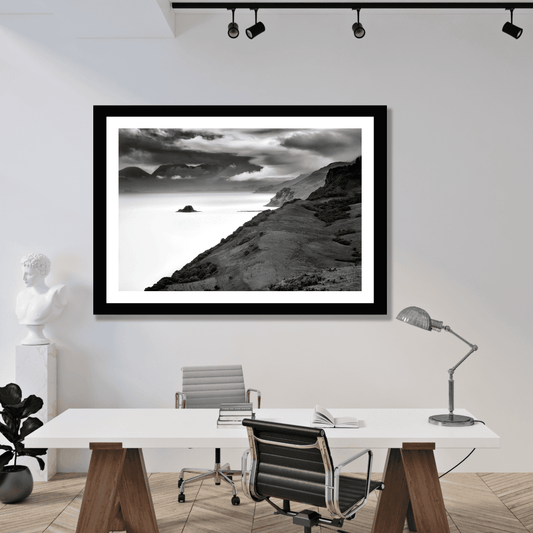 Framed Holm Island – Black & White Fine Art Print displayed in a modern office, ideal for interior designers seeking Scottish landscape wall art.