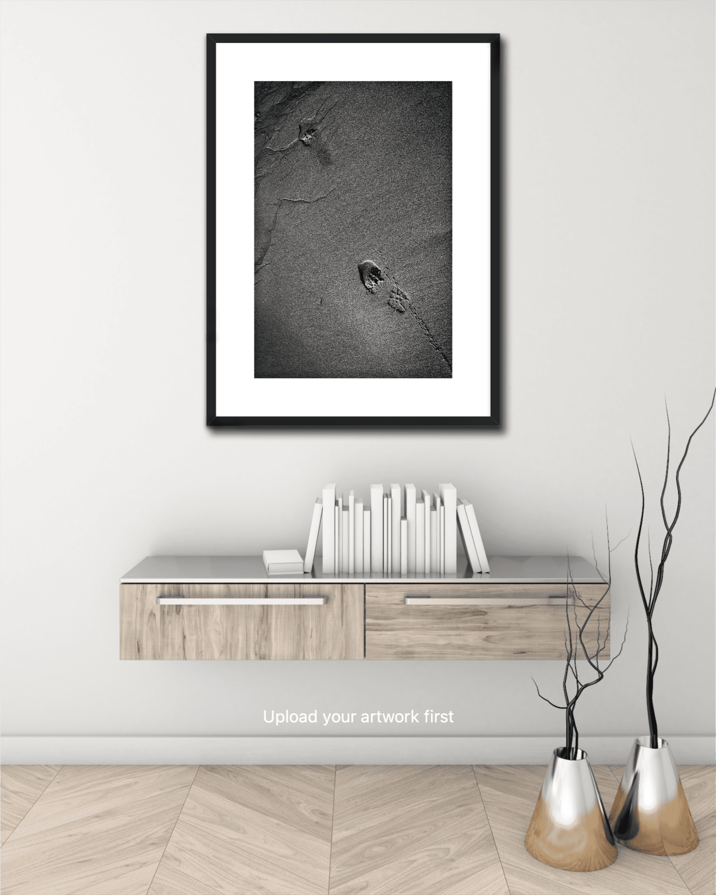 Framed Traces #1 black and white sand and footprint photo displayed above a modern console, ideal for minimalist interior design art.