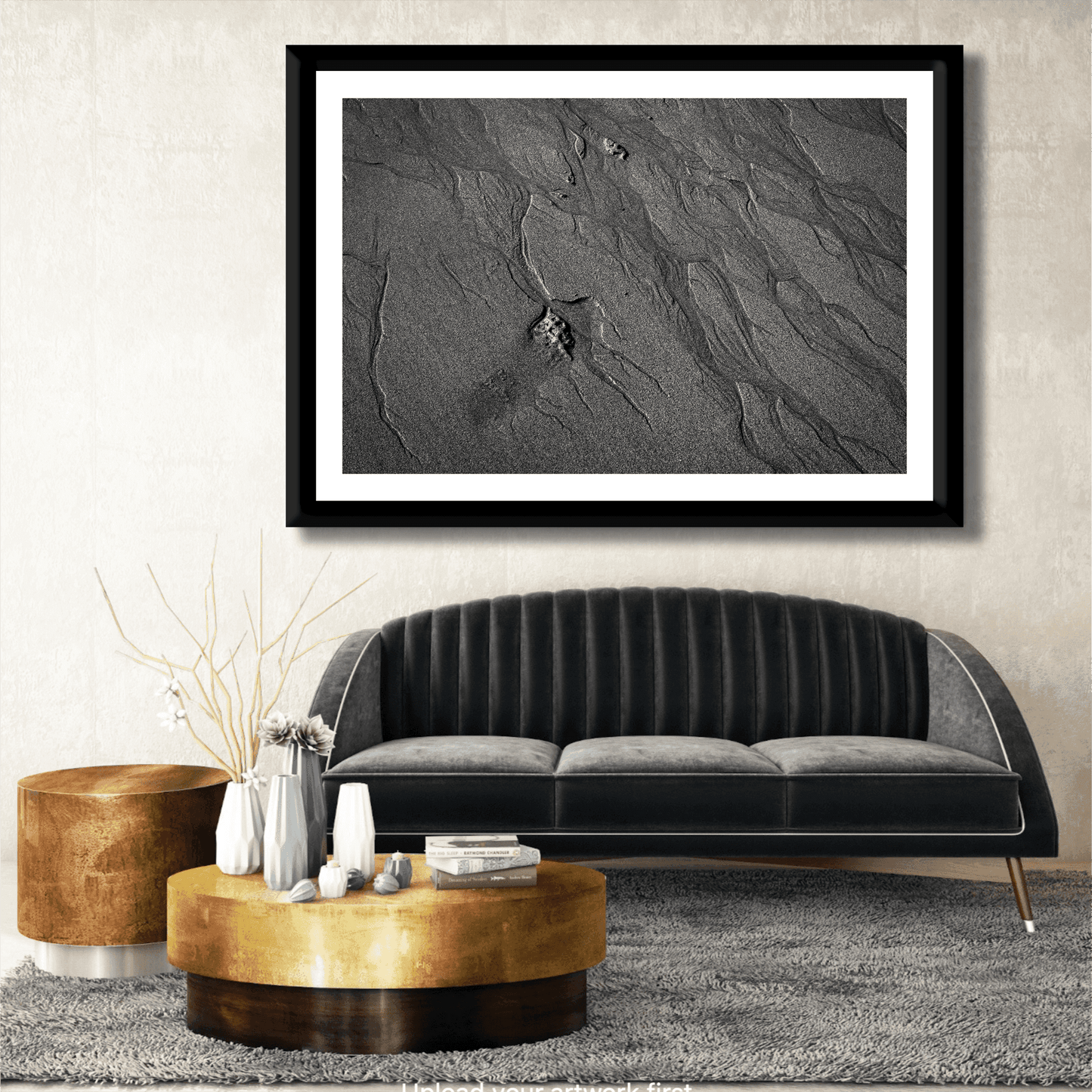 Traces #2 black and white sand photography displayed above a black velvet sofa. Elegant fine art print adds texture to luxury living room.