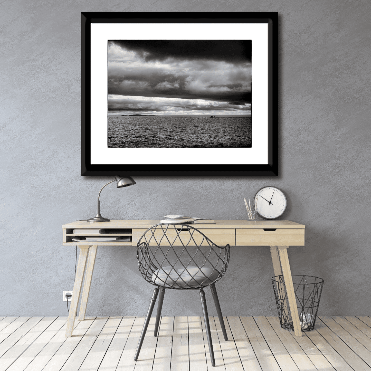 The View From Marshall Point – The Maine Coast in Black and White framed print above a minimalist desk. Serene black-and-white coastal art for home office decor.