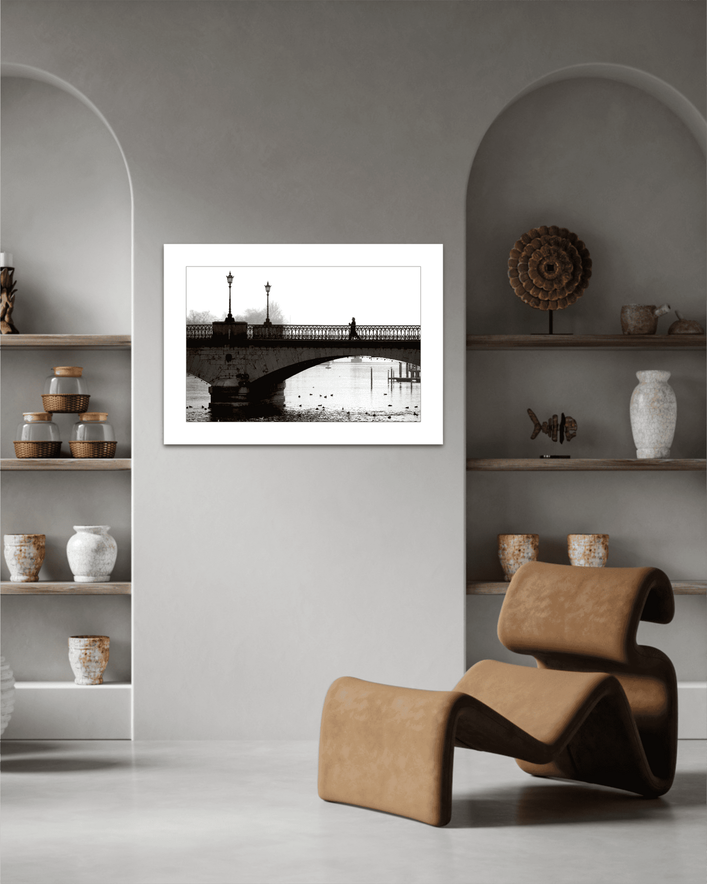 Zurich Series #1 – A Man on the Bridge, Zurich in Black and White – Fine Art Print by Michael Hart displayed in a modern neutral-toned living room with sculptural decor.