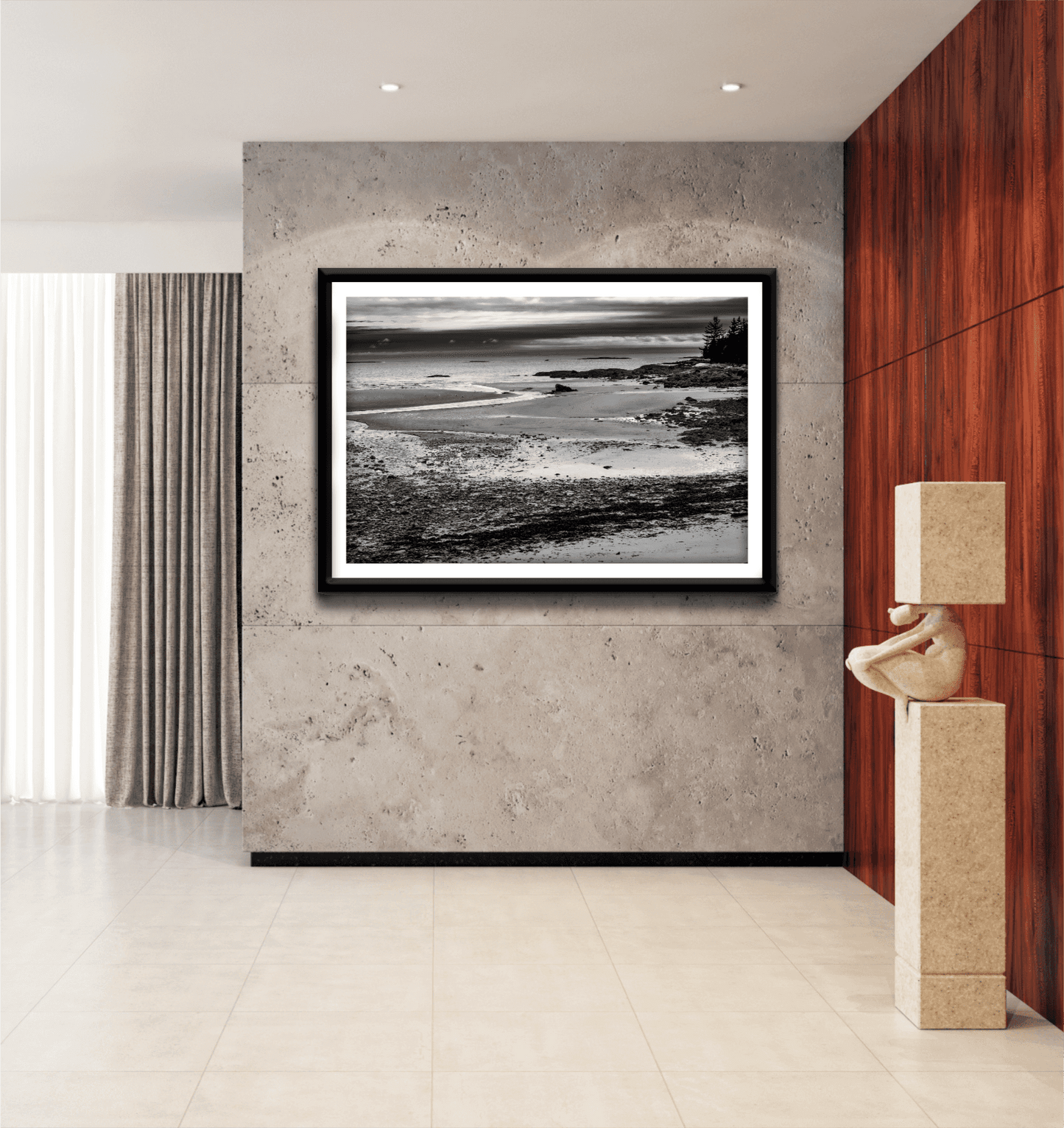 Grey Atlantic #2 – Black and White Coastal Photography in Maine displayed in a modern living room with concrete walls. A serene seascape print perfect for contemporary interior design.