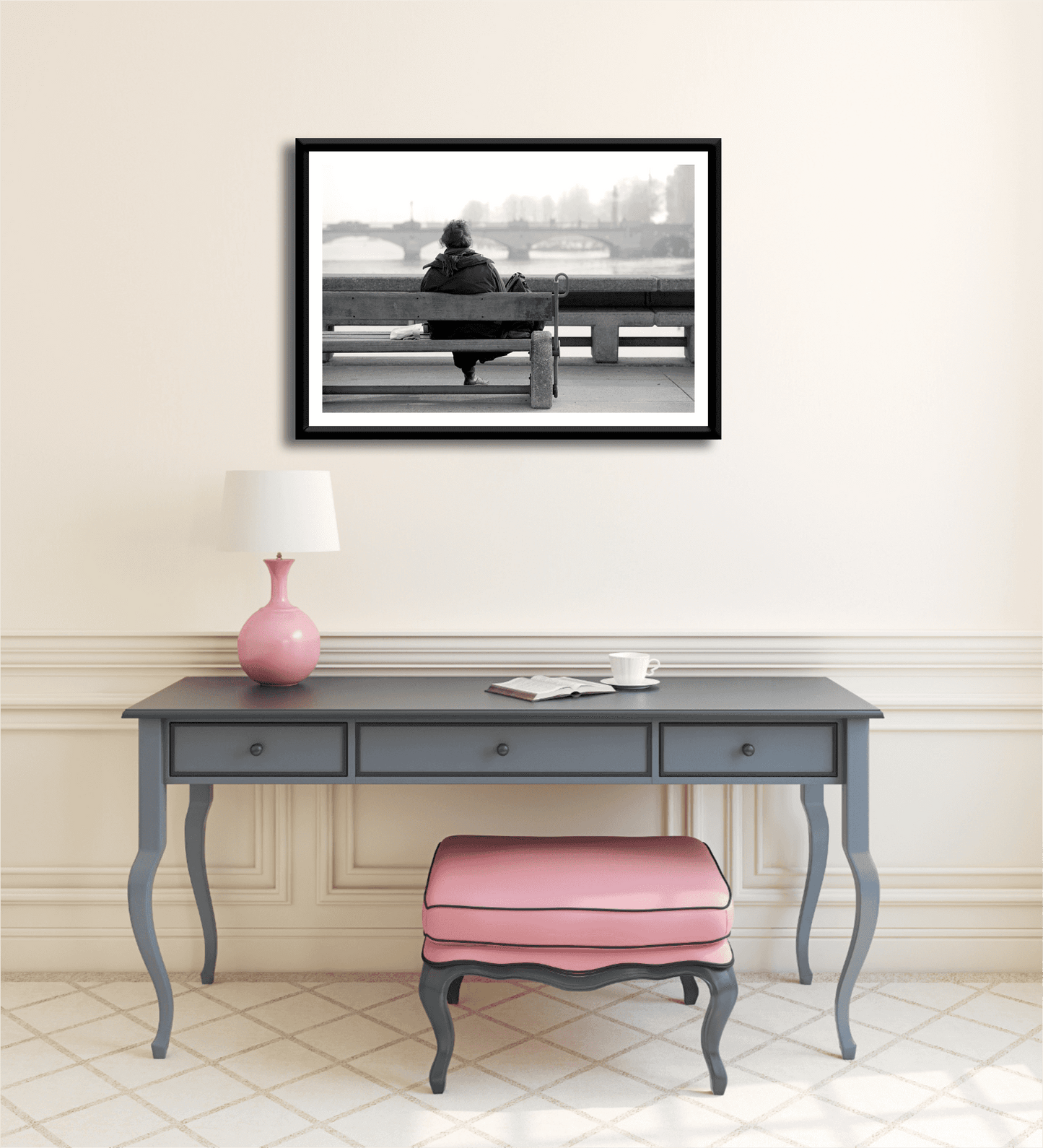Zurich Series #6 – The Woman Overlooking the River Limmat framed black and white fine art print by Michael Hart displayed above a vintage desk in a soft-toned interior. Ideal for elegant home decor or art collectors.