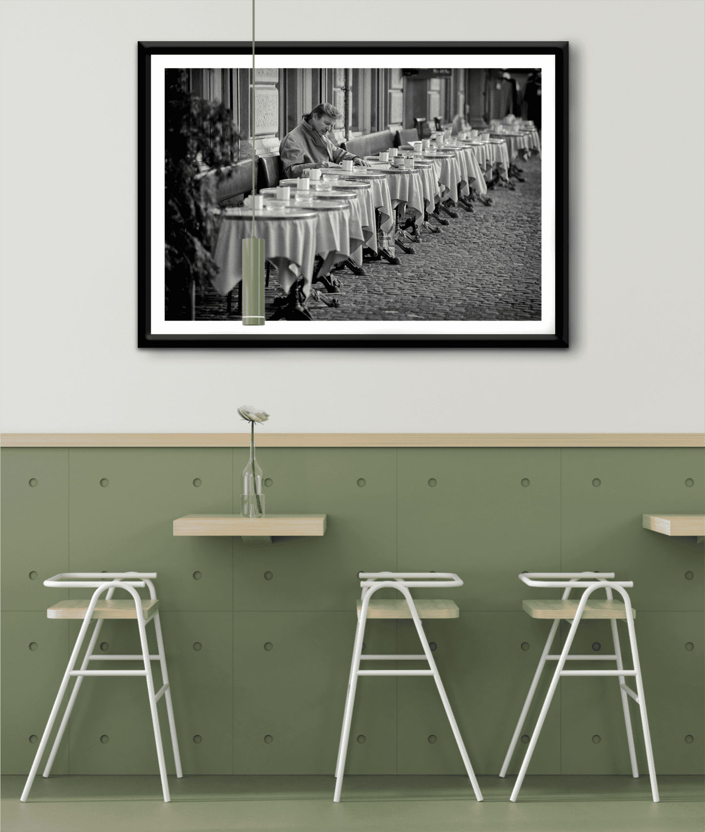 Zurich Series #3 – The Man at the Café, Zurich in Black and White – Fine Art Print by Michael Hart displayed in a modern kitchen café. A striking black and white artwork perfect for contemporary home or restaurant decor.