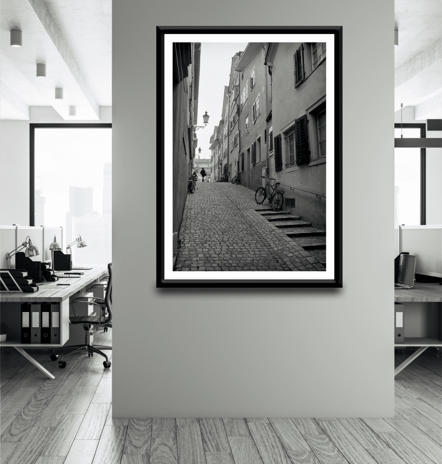 Zurich Series #5 black and white fine art print by Michael Hart mounted in a corporate office. Elegant Zurich street scene adds artistic flair to professional interiors.