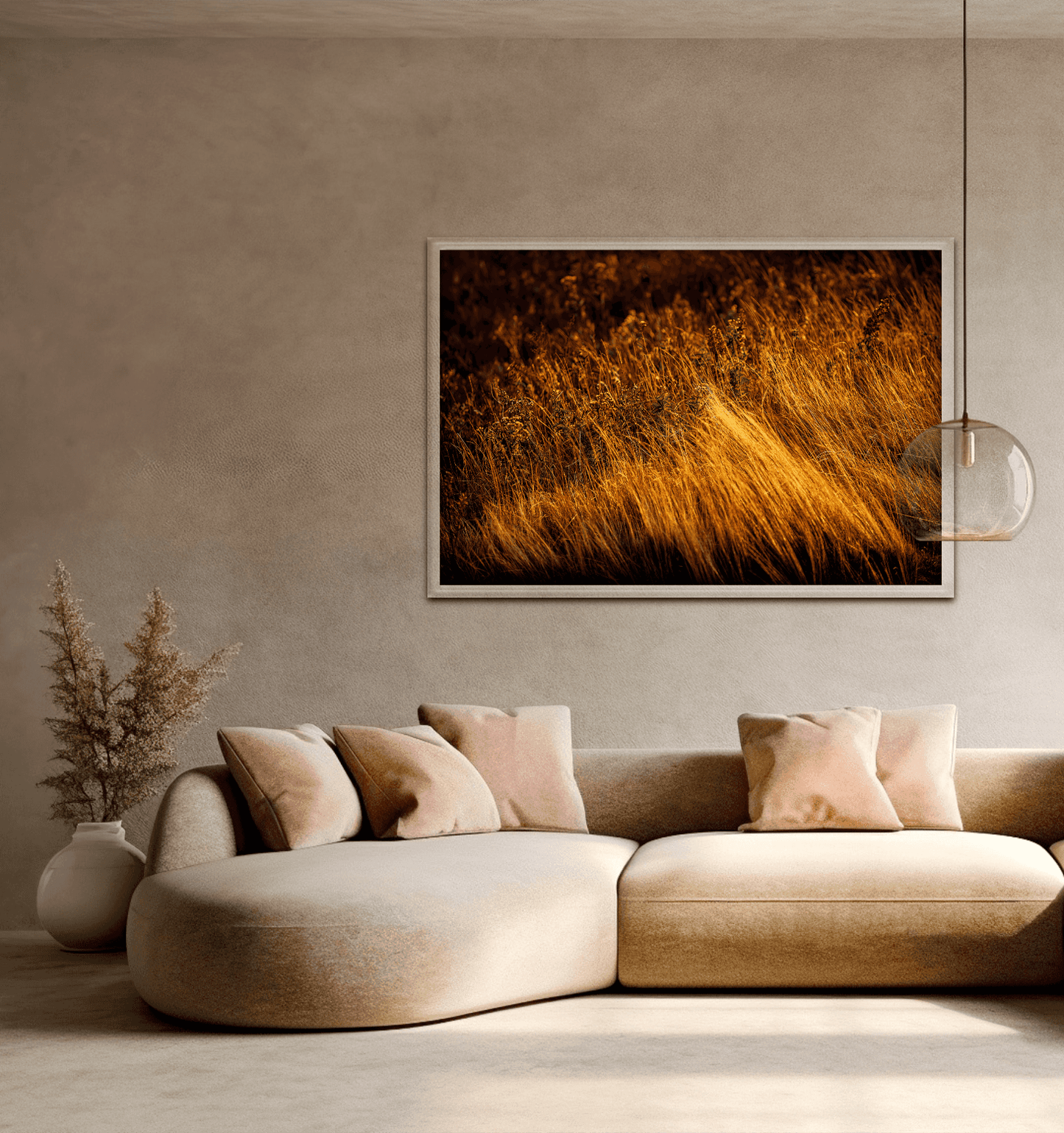 Limited Edition Autumn Grasses #1, Acadia photograph mounted above a curved beige sofa in a neutral-toned living space, perfect for seasonal interior styling.