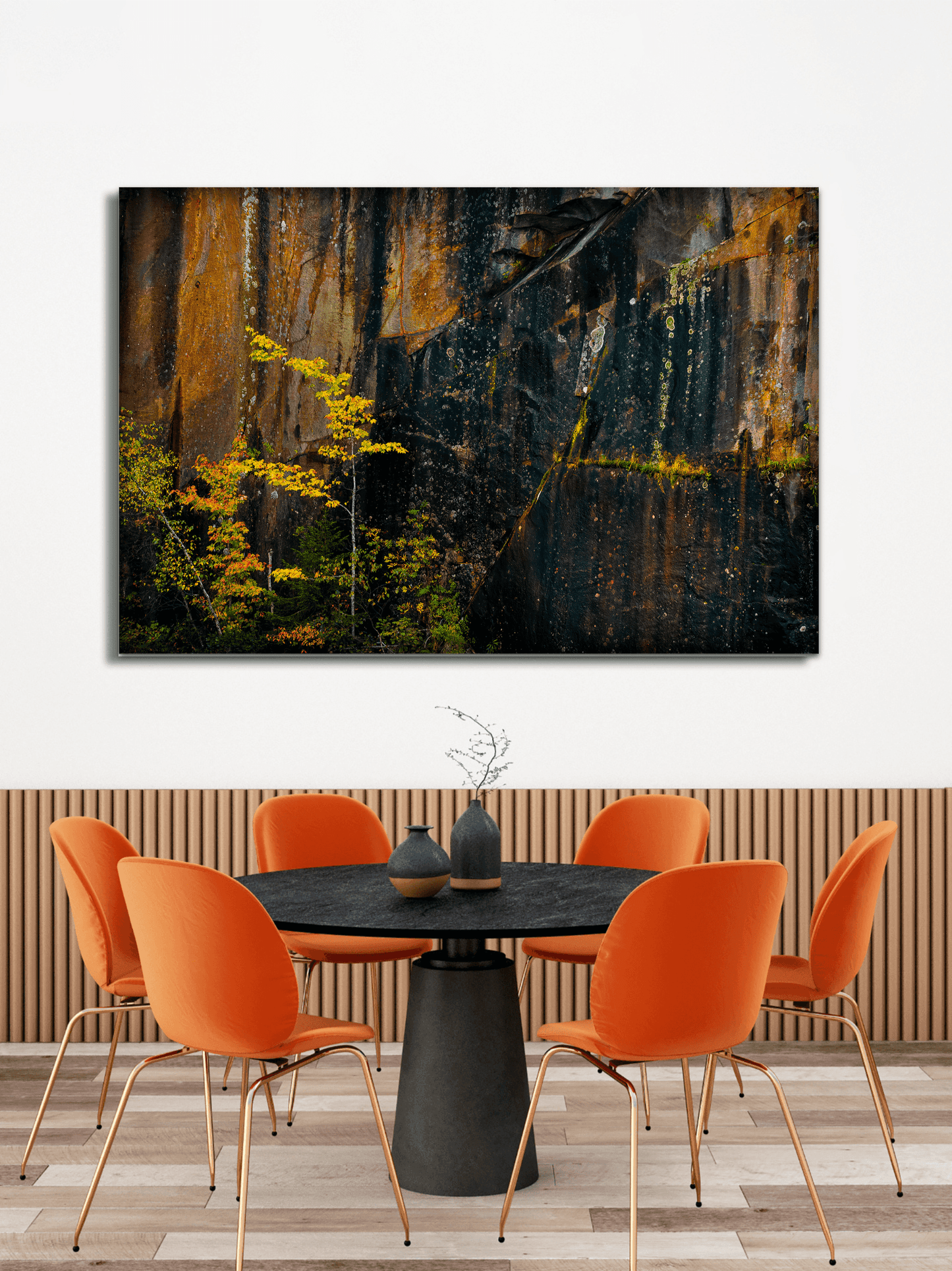 Quarry Wall #1 fine art print with autumn hues by Michael Hart showcased in a dining room with orange chairs, enhancing contemporary decor.