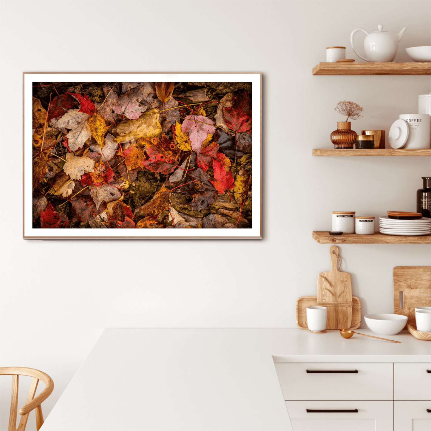 Autumn Leaves Collage – Limited Edition Fine Art Fall Photograph from West Virginia displayed in a modern kitchen. Features vibrant fallen leaves in rich reds, oranges, and browns, ideal for seasonal home decor.