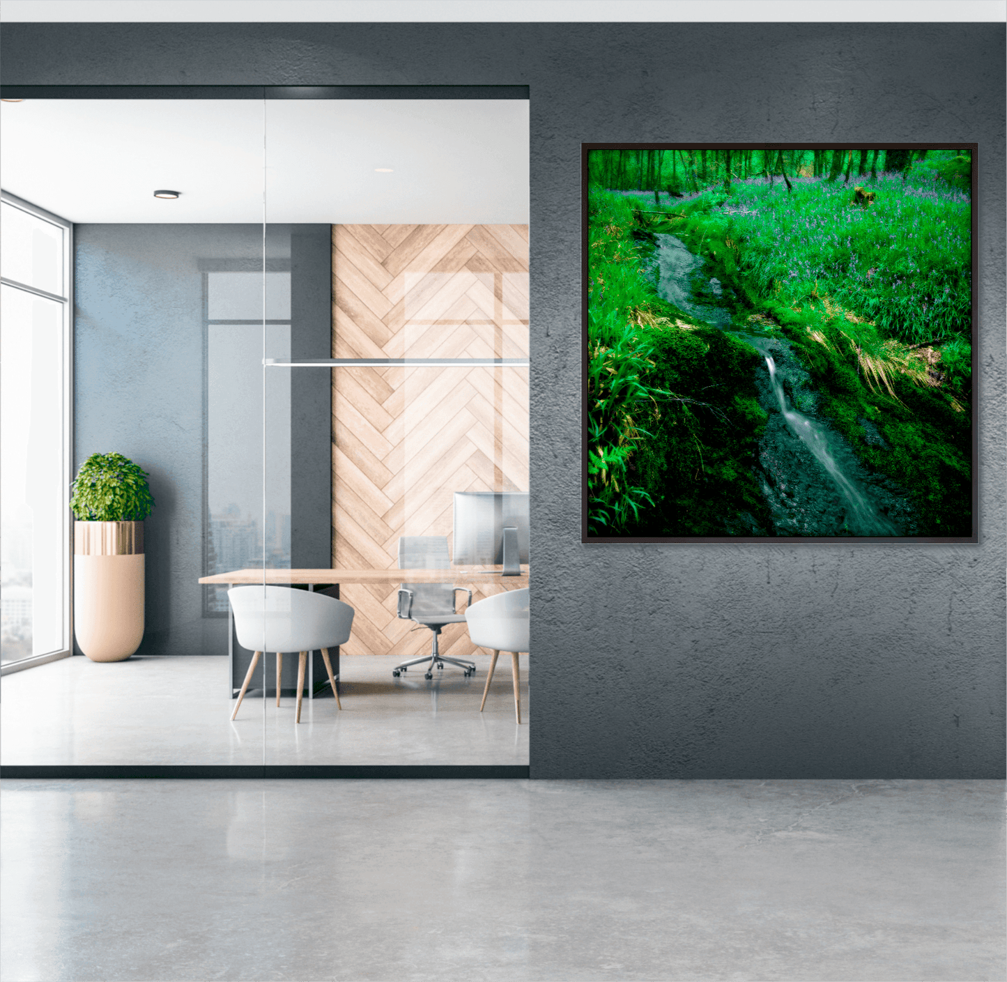 Lomond Creek limited edition Scotland print in a modern office space, depicting a romantic woodland stream and bluebell field near Loch Lomond.