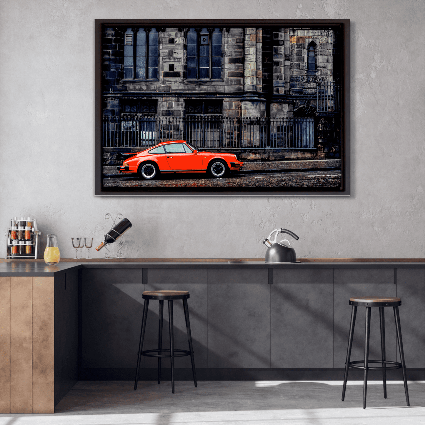 Framed Kodachrome-style print of red Porsche and cathedral architecture, styled above a contemporary kitchen bar area.
