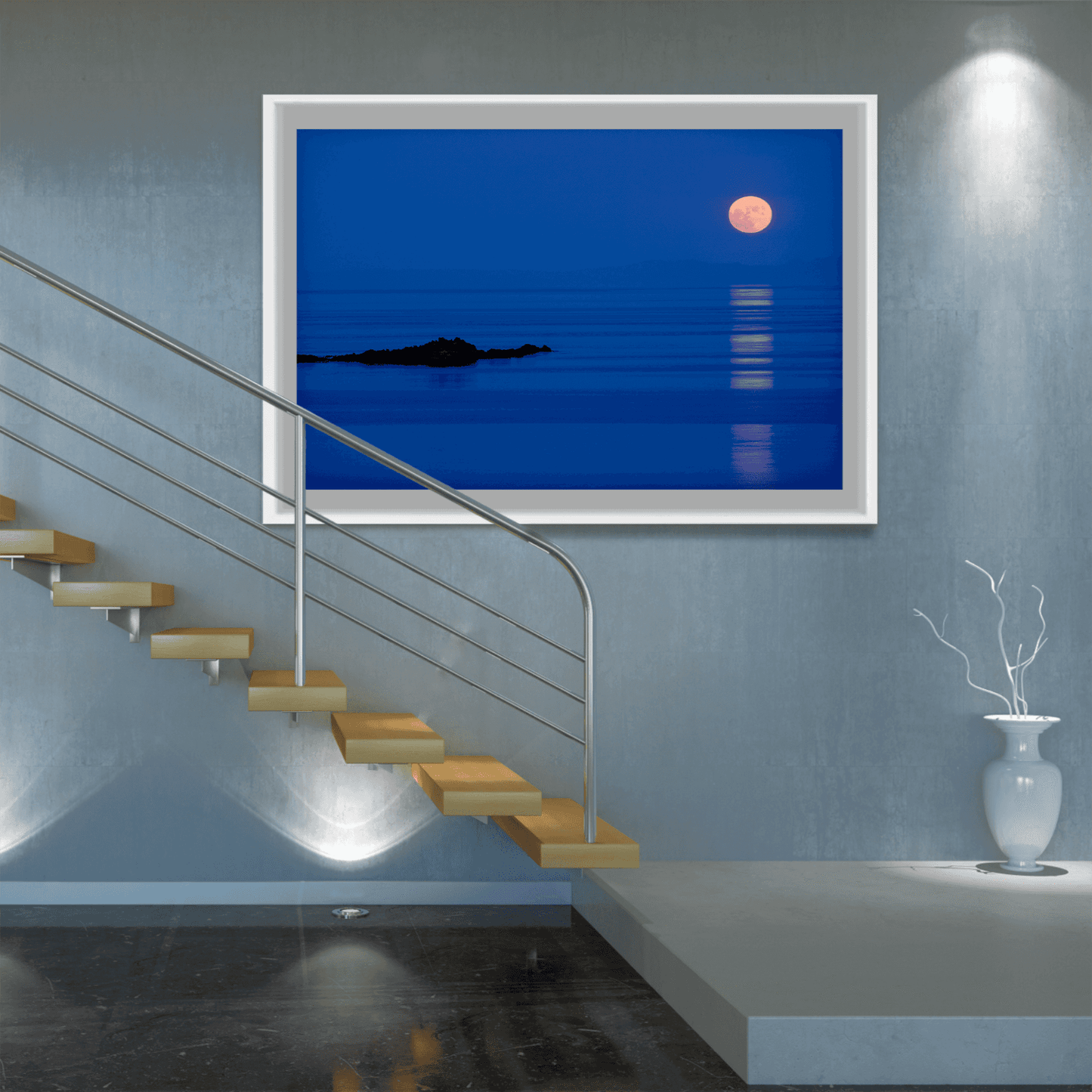 Framed Islay Moonrise over the Atlantic – Fine Art Twilight Photography displayed in a modern stairwell, enhancing home decor with serene blue hour tones and Scottish seascape elegance.