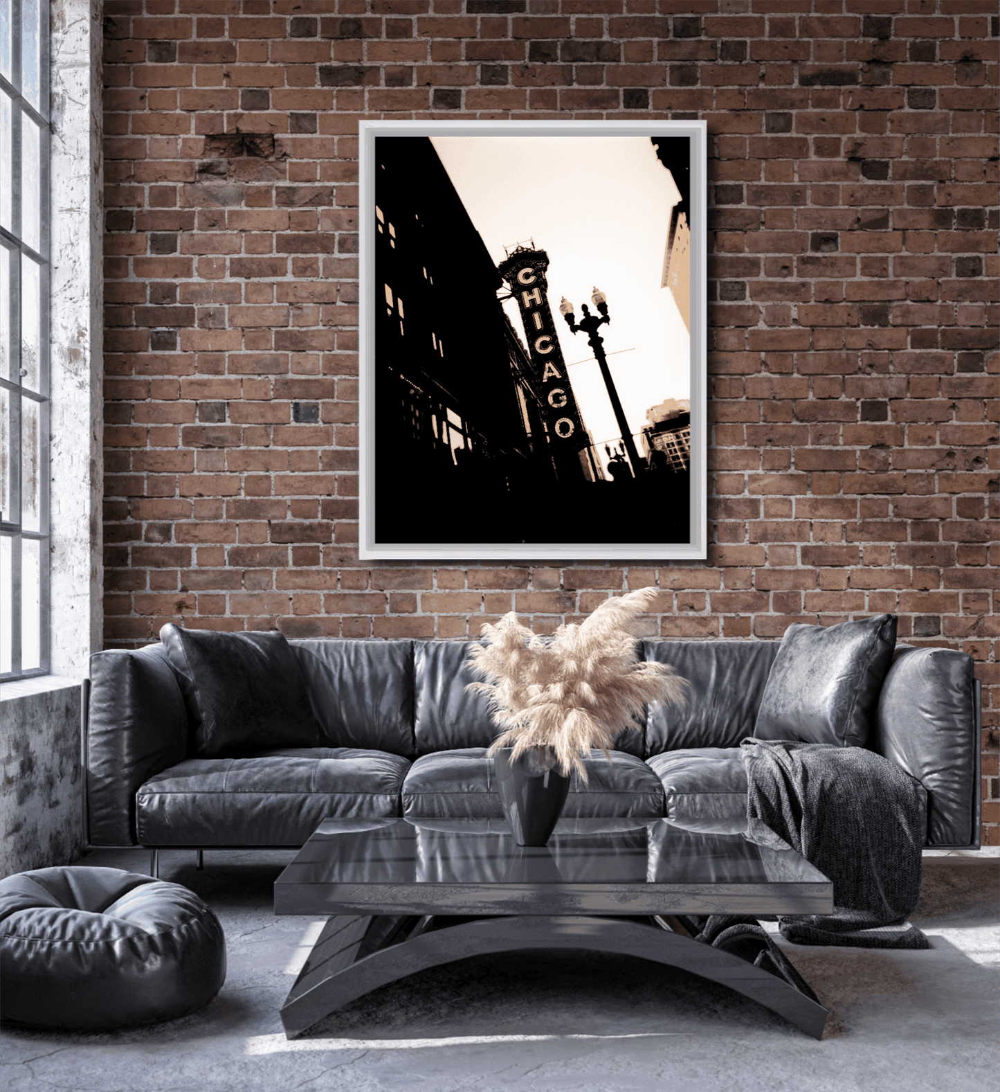 Chicago Theatre – Chicago Landmark vertical sepia print framed in white, showcased in an industrial loft living room with brick walls and leather sofa.