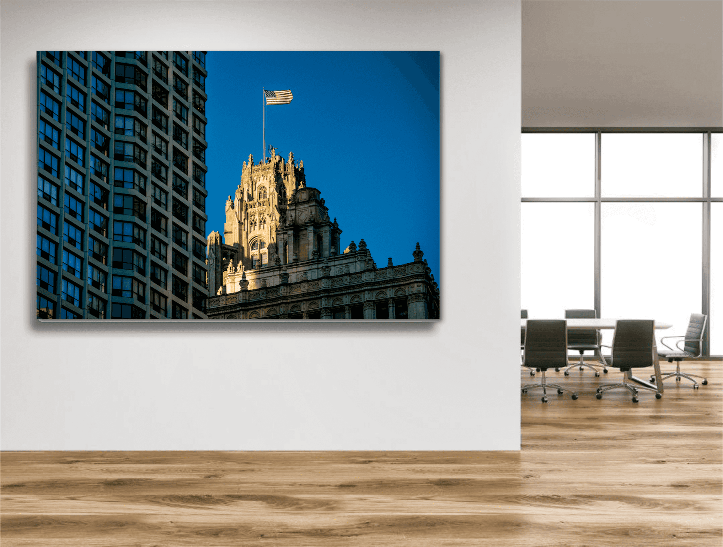 Tribune Tower and American flag summer photo by Michael Hart displayed in sleek conference room. Limited edition Chicago skyline fine art print.