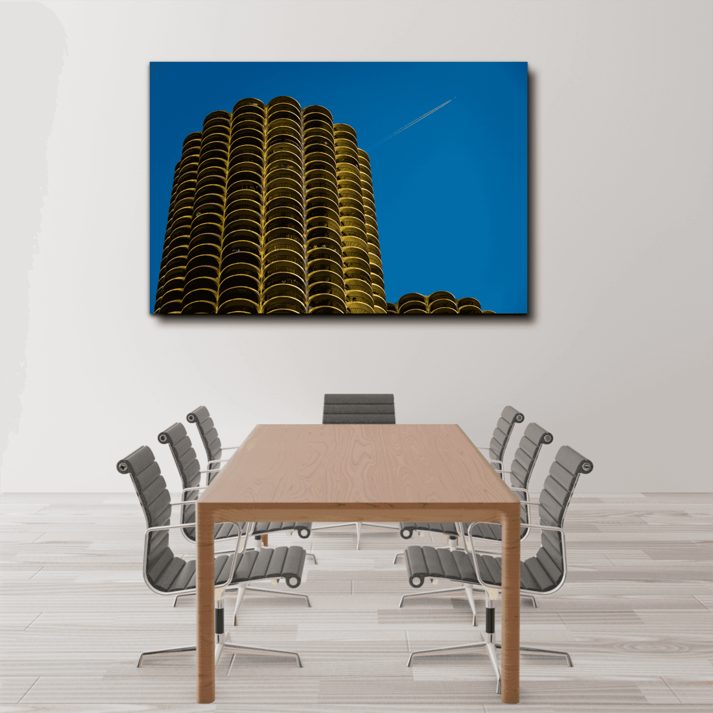 Large Marina Towers photo print by Michael Hart displayed in a sleek conference room. The iconic Chicago architecture adds a professional and artistic touch to the space.