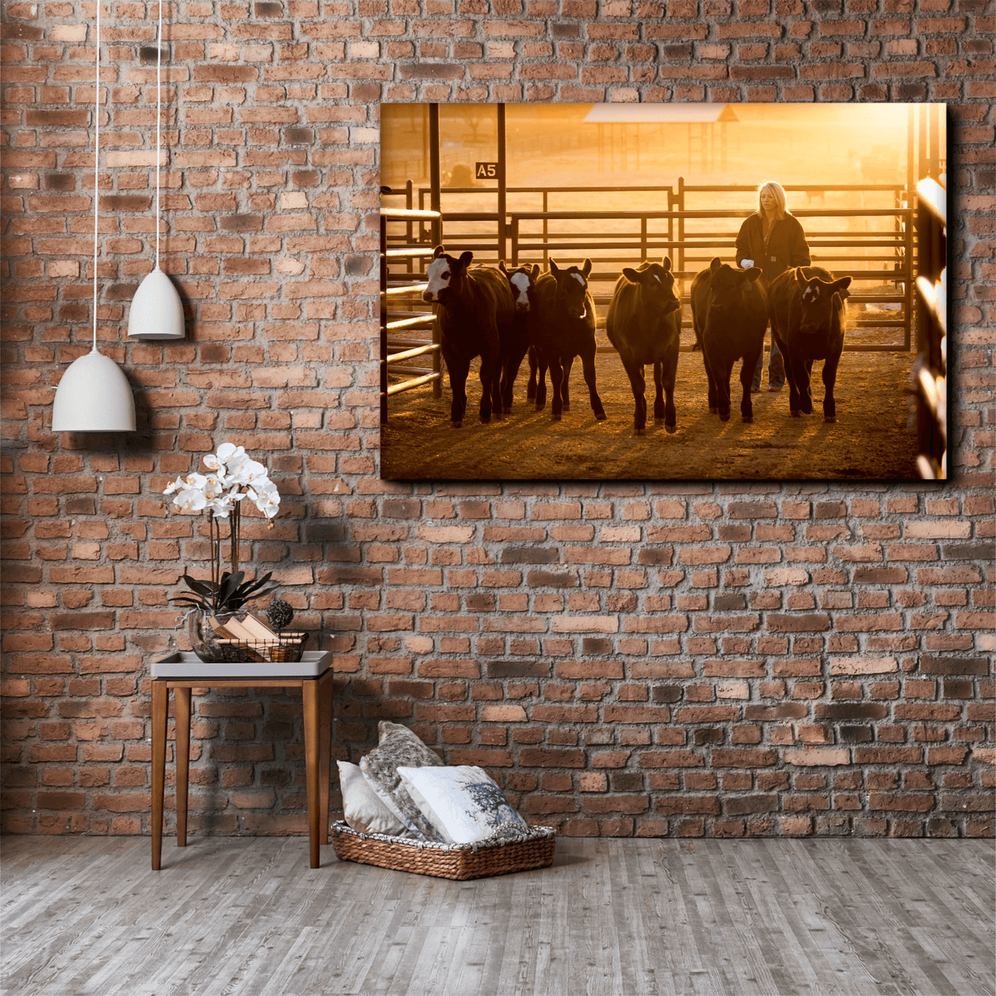 Limited edition fine art print 'Calves at Daybreak: A Texas Ranch Morning in Golden Light' featuring a female ranch hand guiding calves at sunrise. Western wall art perfect for rustic home decor and showcasing rural lifestyle photography.