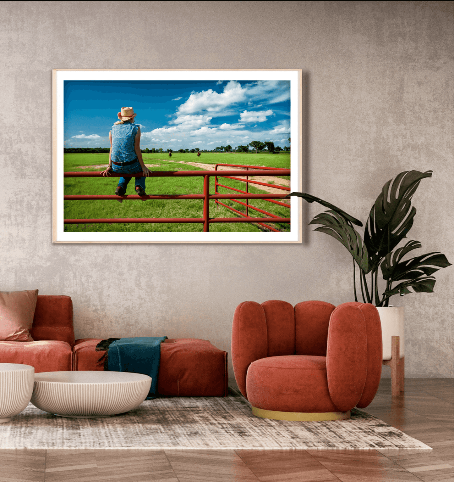 Coming Home: Waiting on the Fenceline at 44 Farms framed wall art displayed in a modern home with rust-colored chair and neutral decor. Western ranch life photography.