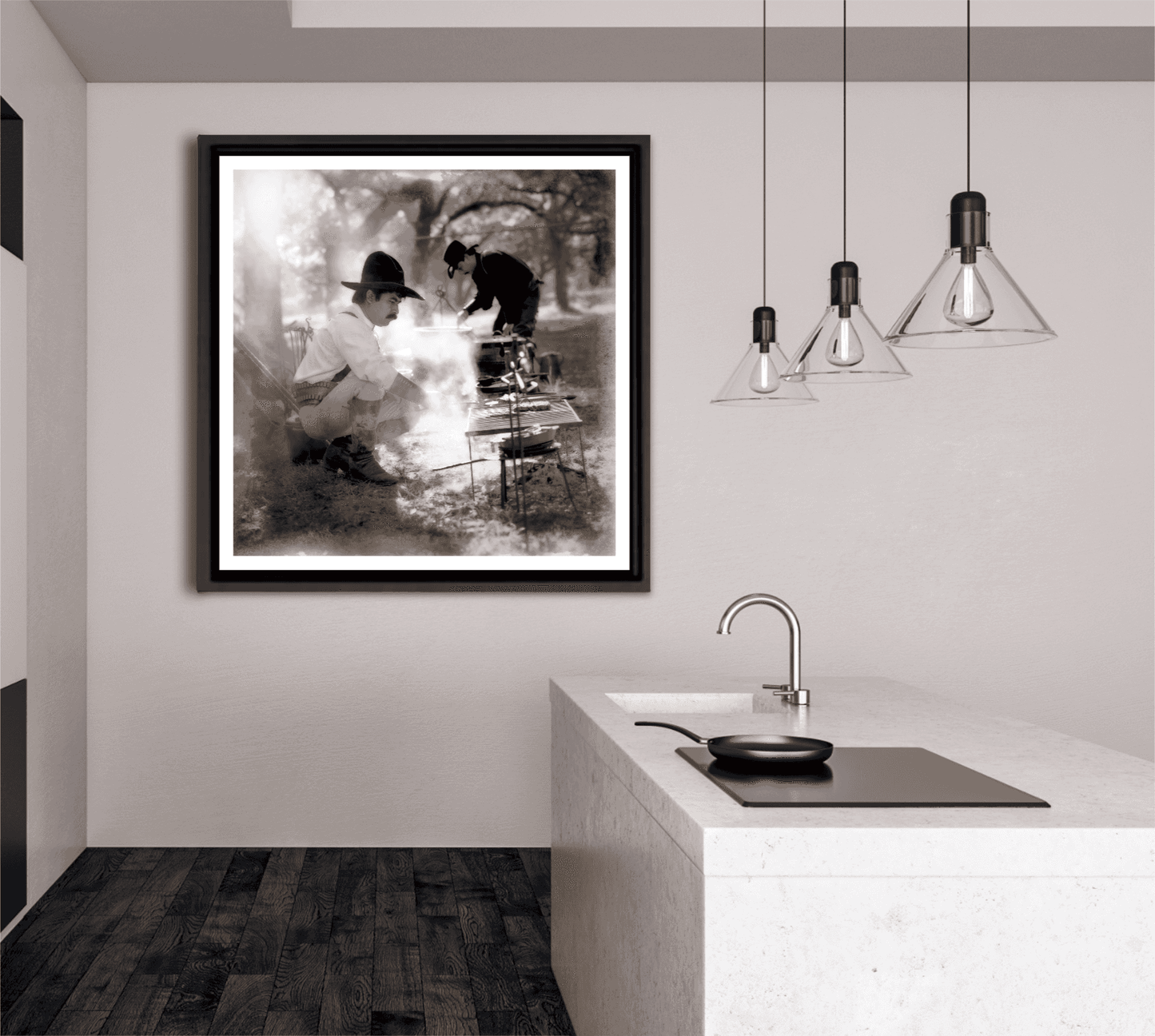 Limited edition Western wall art of chuckwagon cooking scene displayed in sleek kitchen with pendant lights, highlighting cowboy culture in decor.