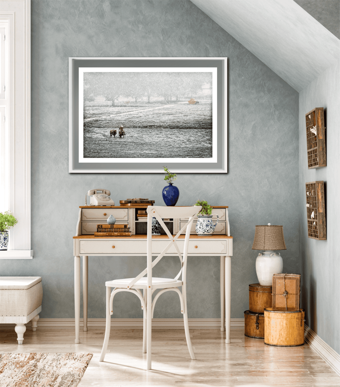 Framed Home for Christmas – The Cowboy and The Horse artwork displayed above a vintage writing desk, enhancing rustic holiday interior decor.