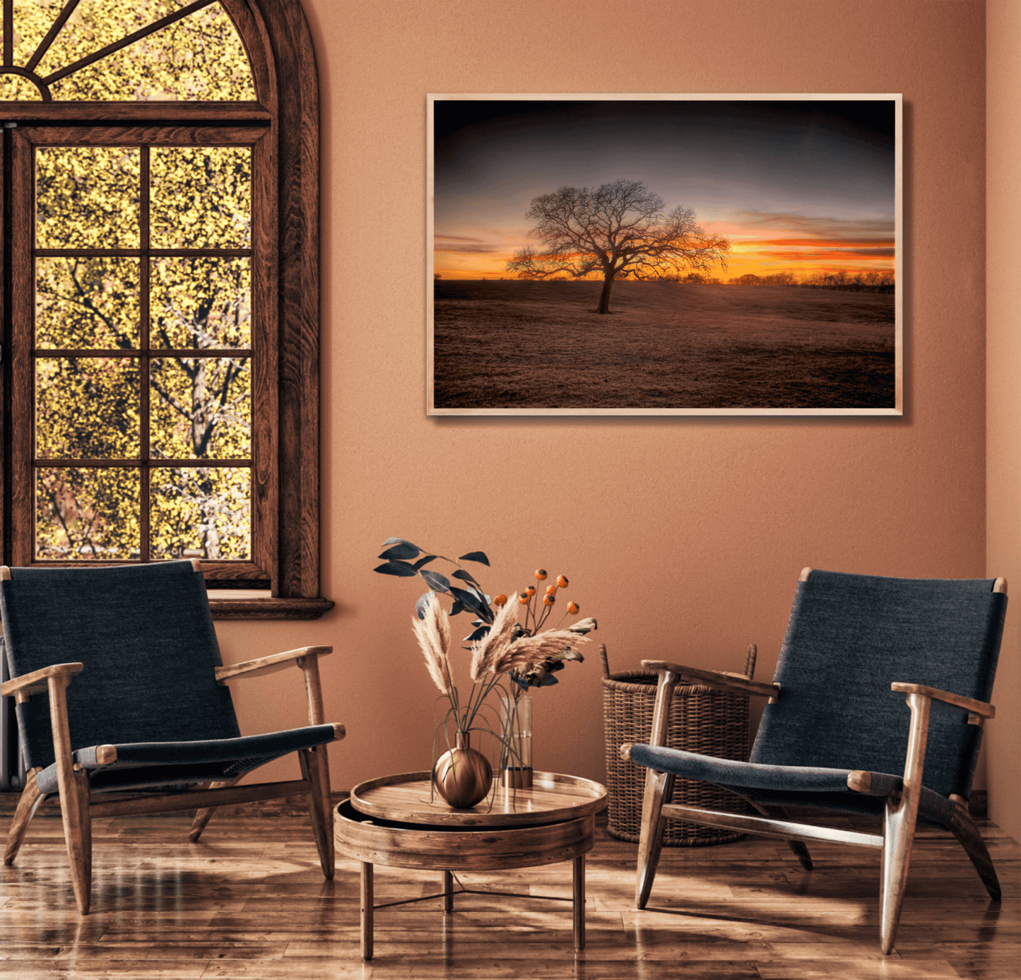 Lone Tree at Sunset – Fine Art Photograph at 44 Farms, Texas Ranch displayed in a cozy living room with earthy tones. A perfect limited edition wall art for interior designers.