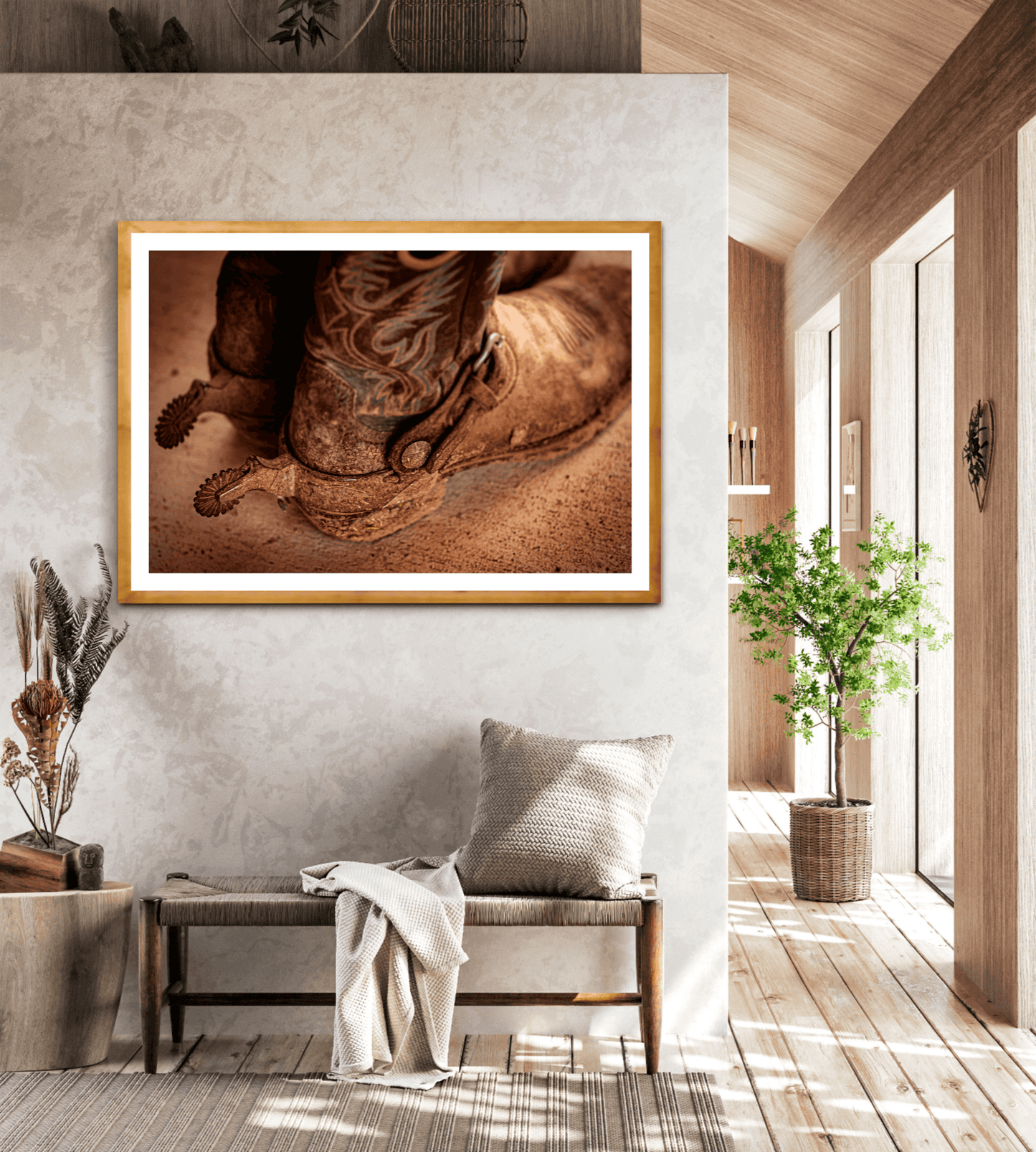 Framed Western fine art print 'Well Worn – A Real Texan’s Cowboy Boots' by Michael Hart displayed in rustic hallway decor, ideal for Texas ranch-style interiors.