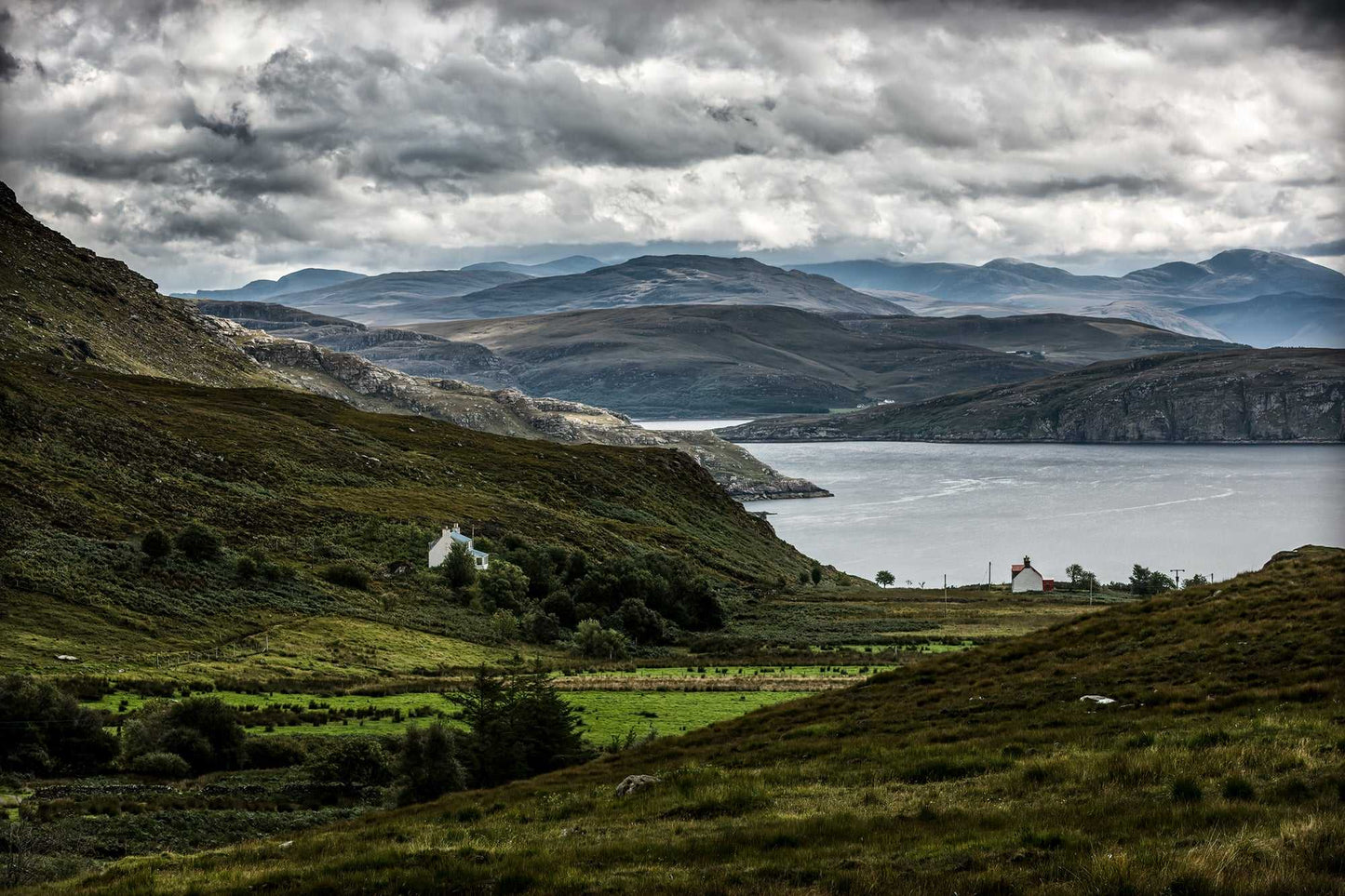Culnacraig – Scotland’s Wild West Coast in Light and Shadow fine art print featuring dramatic clouds over a remote coastal landscape with cottages.