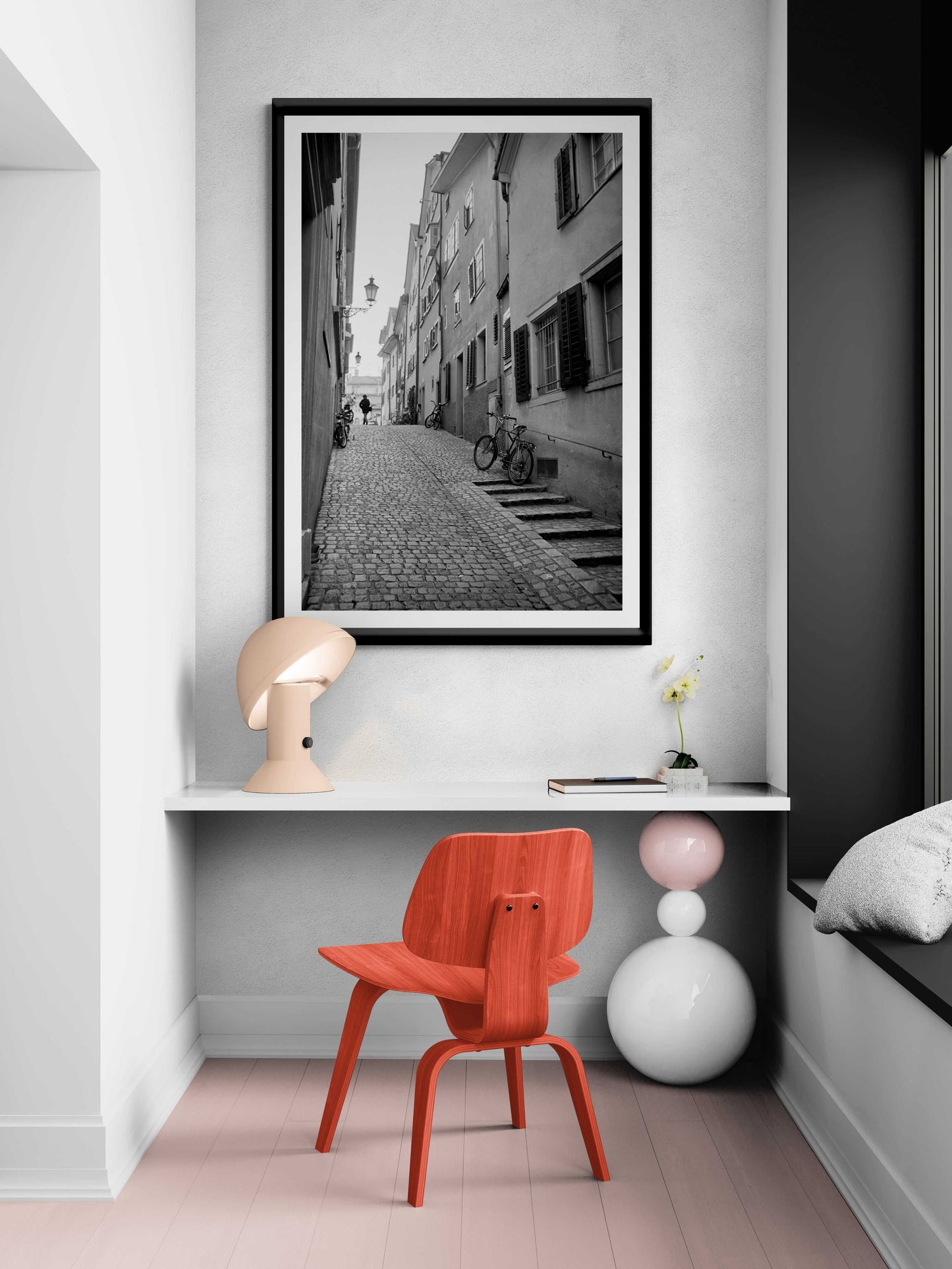 Zurich Series #5 framed black and white fine art print by Michael Hart displayed in a modern home office nook. Elegant European street scene enhances interior decor.
