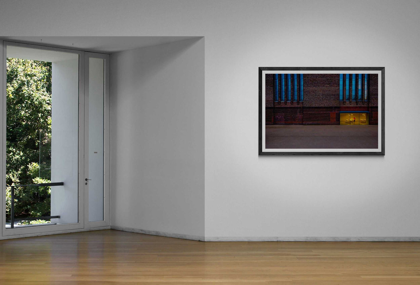 The Tate Modern – A Study in Color and Line fine art print mounted in a bright gallery space with natural light, emphasizing its architectural and color contrasts.