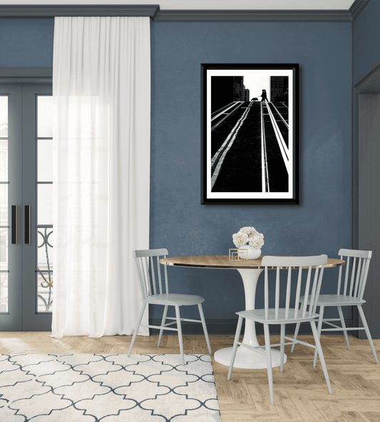 Framed San Francisco Photography-Serendipitous Street Art print displayed in a modern dining room, enhancing interior design with dramatic black and white urban wall art.