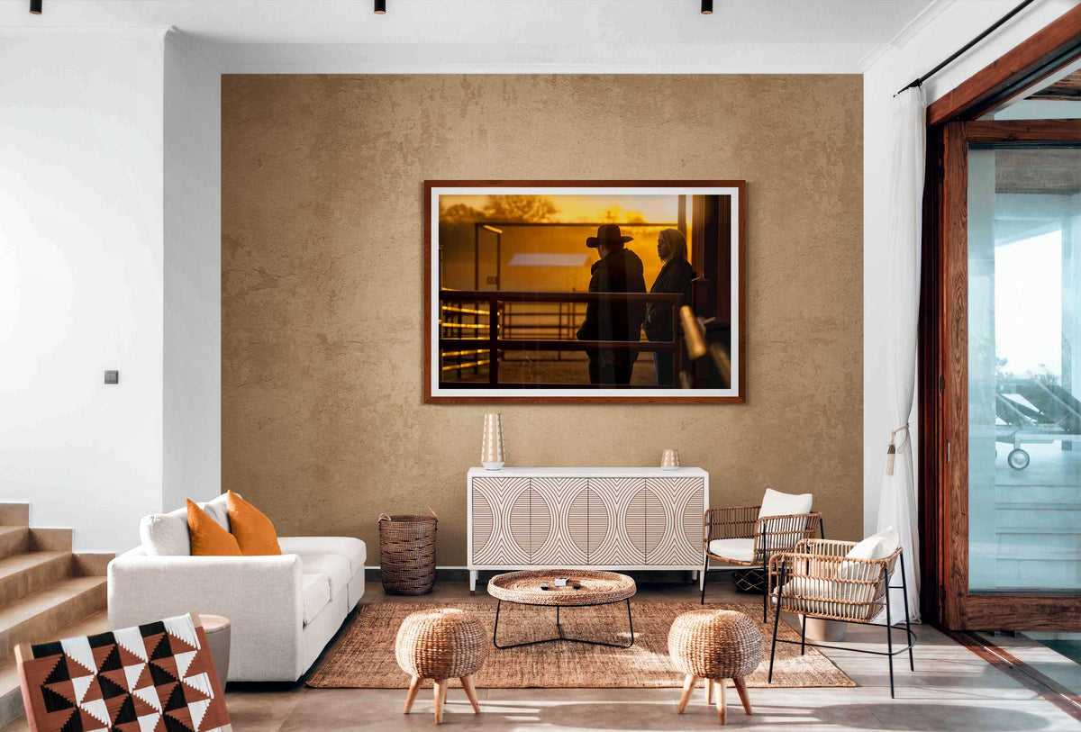 Corral Sunrise cowboy print in a boho-style living room, adding warmth and rural Americana charm to Western lifestyle-inspired home decor.