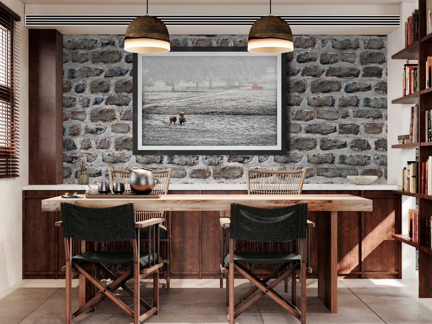 Home for Christmas – The Cowboy and The Horse print mounted on a stone wall in a cozy dining room, blending Western charm with modern design.