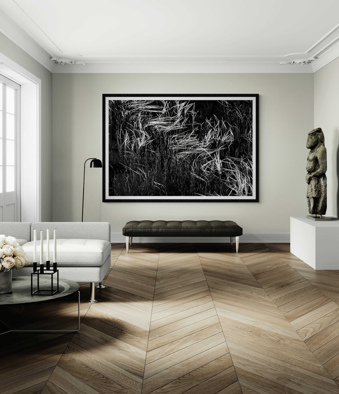 Reeds in Water – Grand Teton Fine Art Black & White Landscape by Michael Hart in a refined living space with wood flooring. Sophisticated wall art piece.