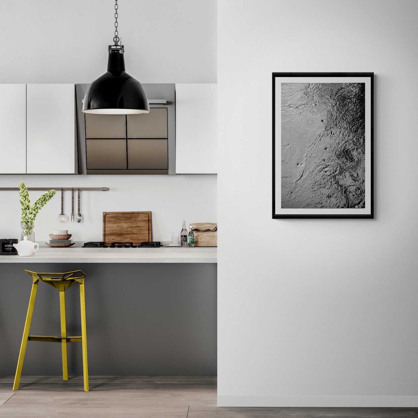 Framed Traces #5 – Currents and Whirlpools in a Maine Stream – Black & White Nature Photography displayed in a modern kitchen interior for minimalist decor.