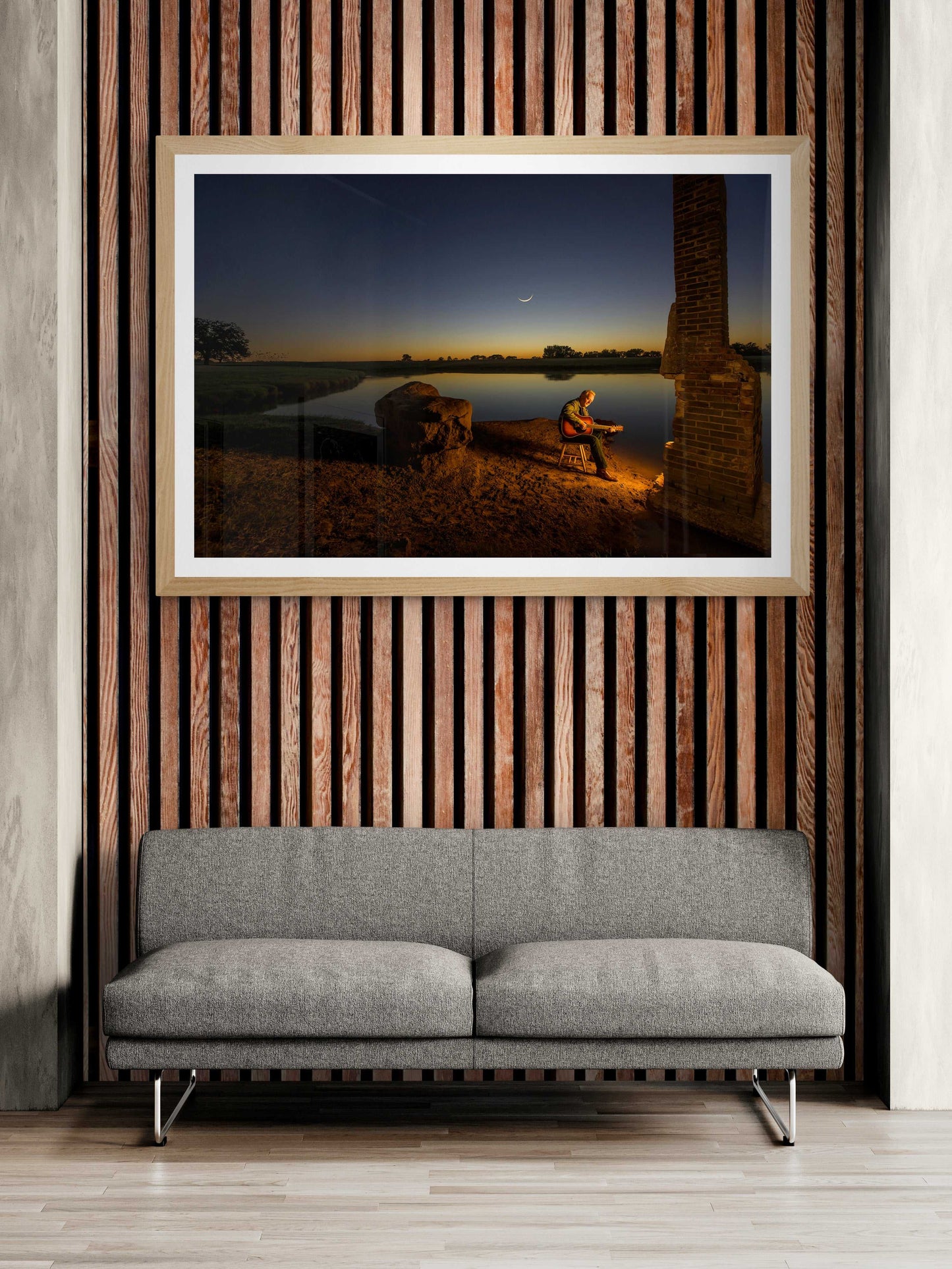 Panoramic Dream Big Texas singer-songwriter print on wood-paneled wall. Adds warmth and musical storytelling to upscale modern interiors.