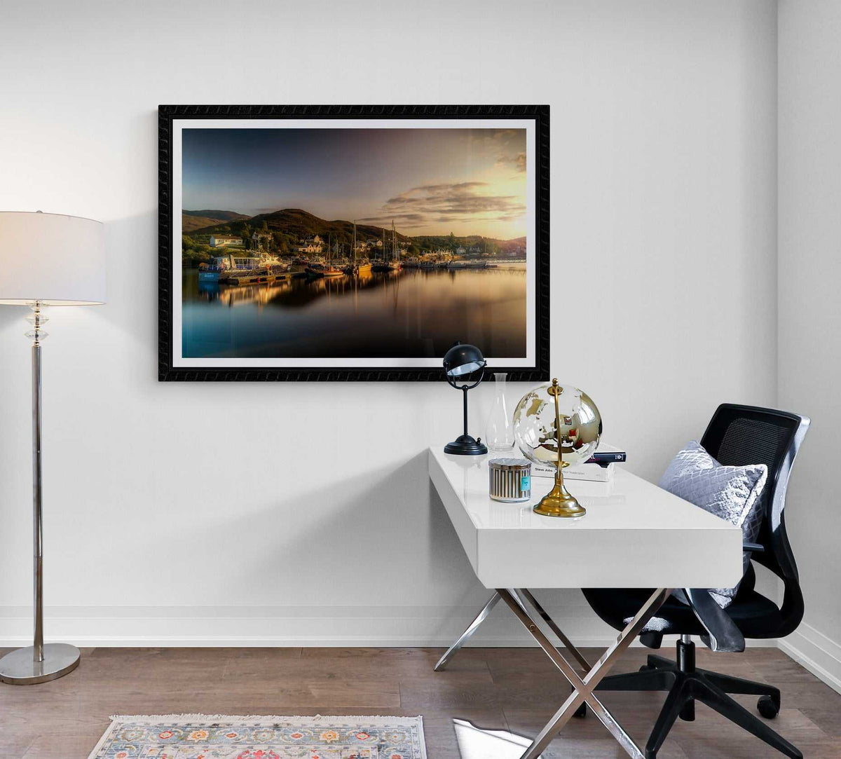 Golden Light over Kyleakin Harbor – Isle of Skye landscape image framed on a white wall above a modern desk, showcasing a serene harbor at sunset.