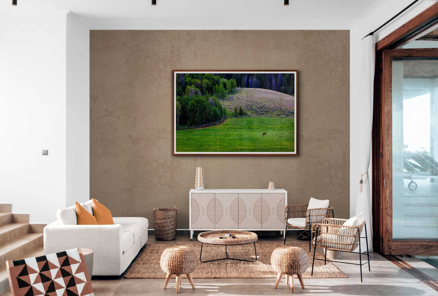 Framed Lone Horse on Gros Ventre Ranch fine art print displayed in a neutral-toned living room with natural textures. Complements rustic and Western interior aesthetics.