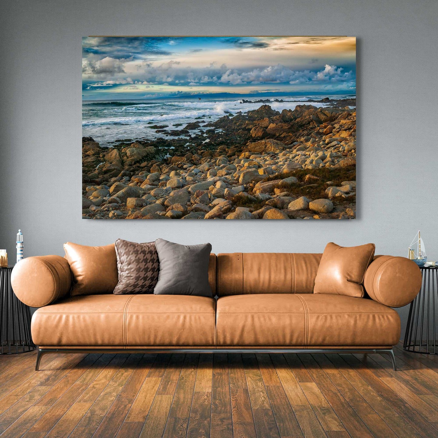 Oversized Monterey Bay – Vibrant California Seascape Limited Edition Print by Michael Hart displayed above a brown leather couch in a rustic-modern space.