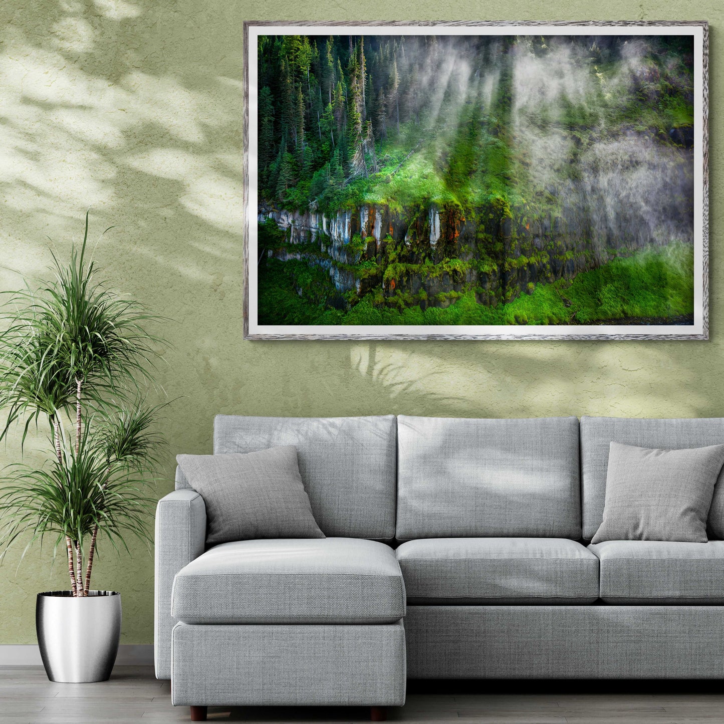 Mesa Falls Mist – Fine Art Photograph by Michael Hart displayed in a modern living room above a gray sectional sofa. Perfect for home decor with a nature theme.