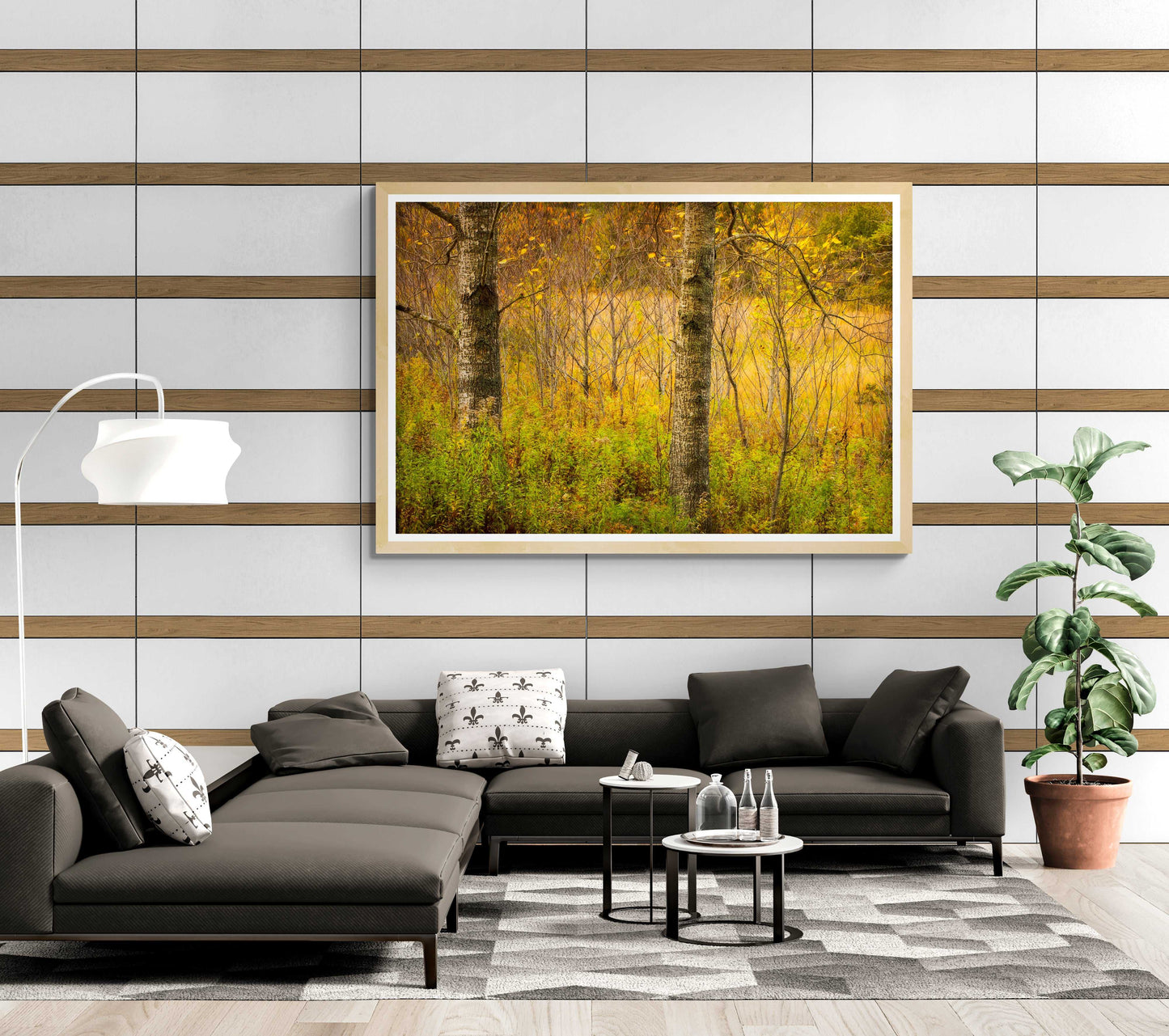 Golden Woods autumn forest artwork framed in a modern living room, bringing warm golden hues and tranquil woodland atmosphere to the space.