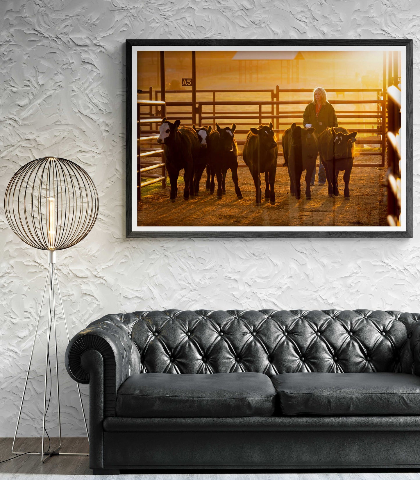 Limited edition fine art print 'Calves at Daybreak: A Texas Ranch Morning in Golden Light' featuring a female ranch hand guiding calves at sunrise. Ideal Western wall art for rustic or farmhouse decor.