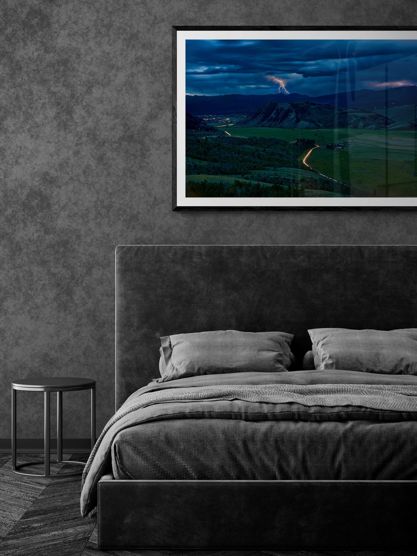 Framed Thunderstorm, Jackson Hole, Wyoming – Fine Art Print above a modern grey bed, ideal for luxury bedroom wall decor in dramatic landscape style.