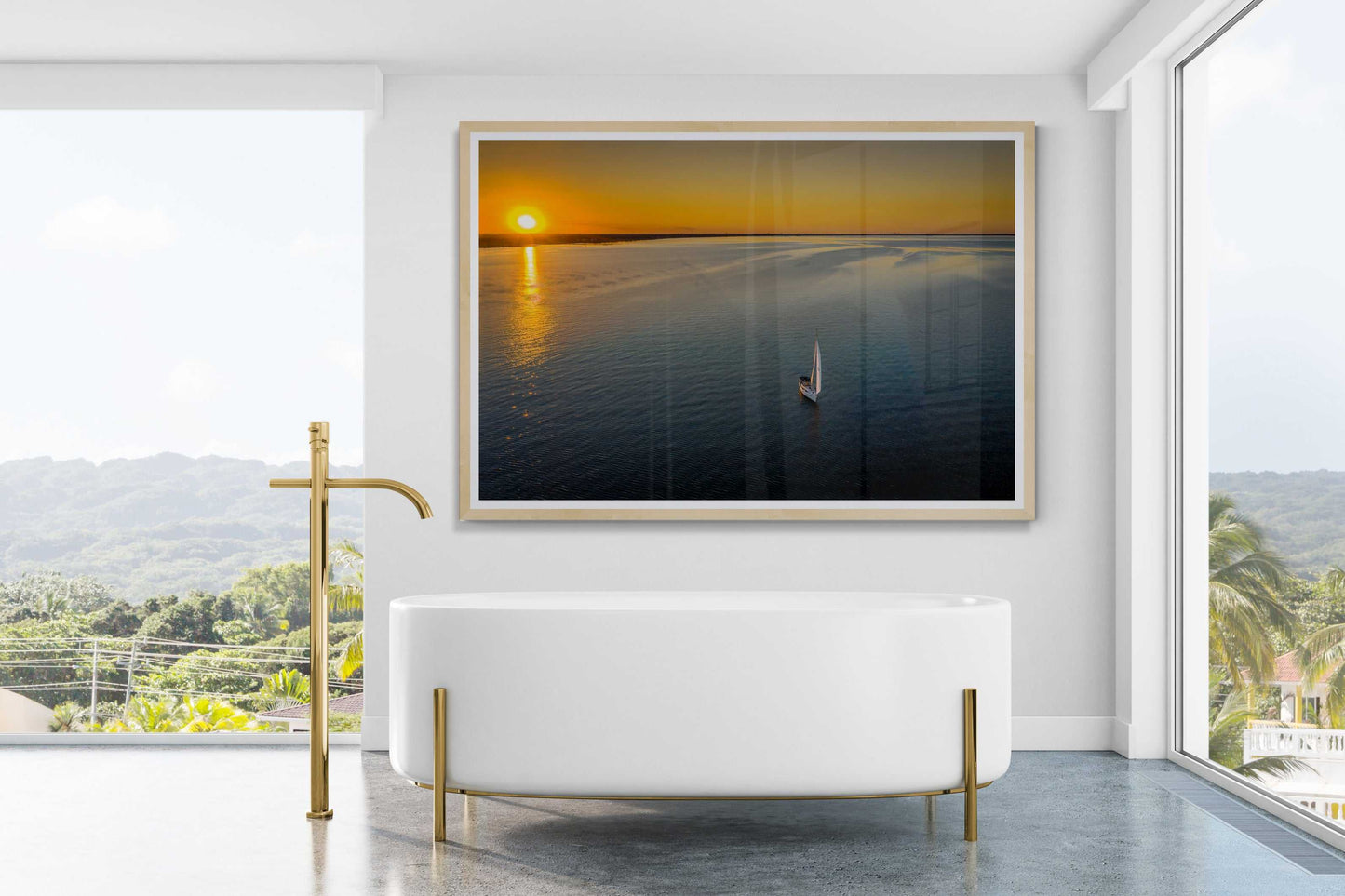 Sunset Sail – Fine Art Aerial Photograph Over Galveston Bay displayed in a luxury bathroom. Nautical wall art complements tropical window view.