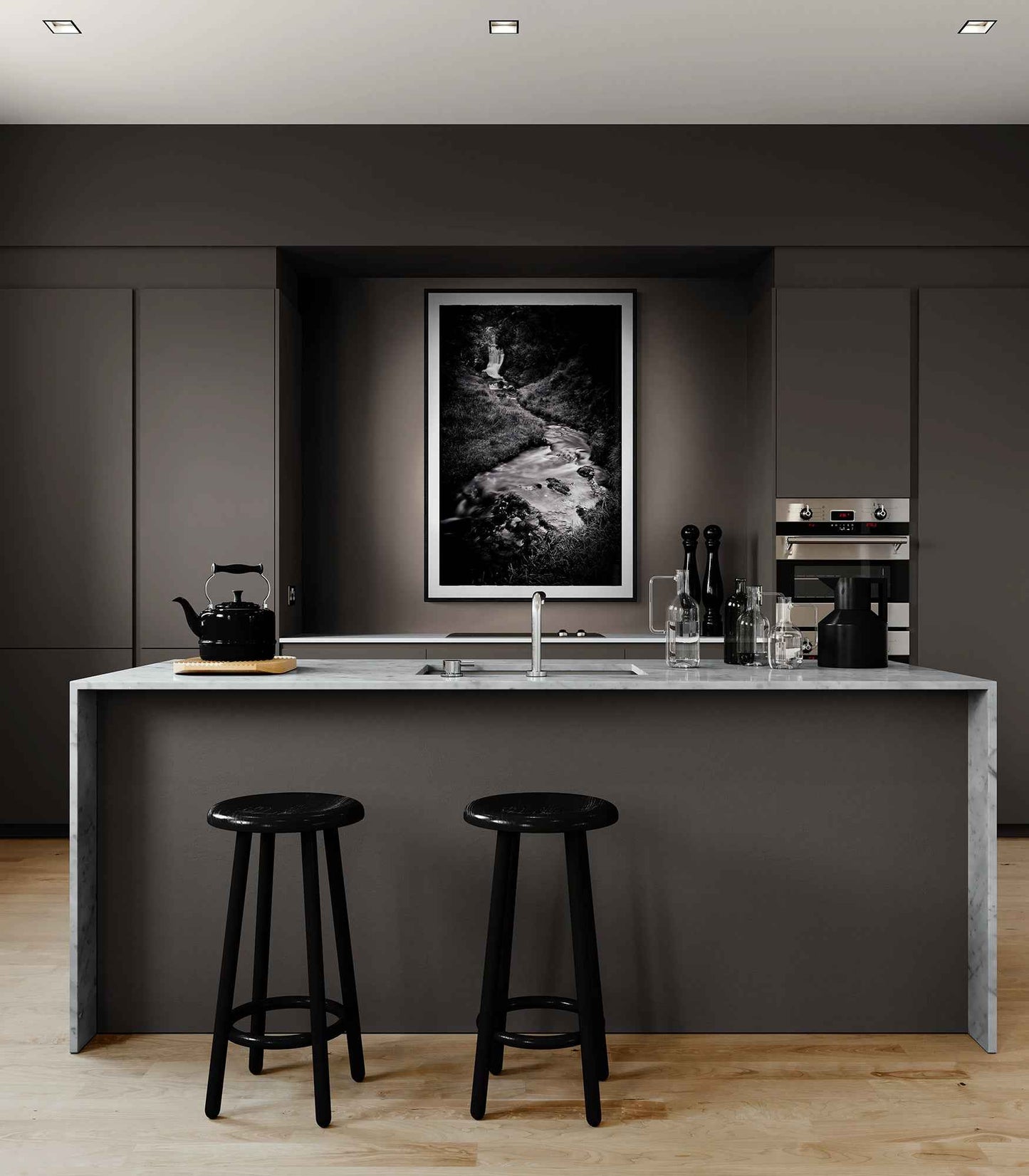 Silk and Stone, Sutherland black and white waterfall print mounted in a sleek kitchen space, adding artistic flair to contemporary interior design.