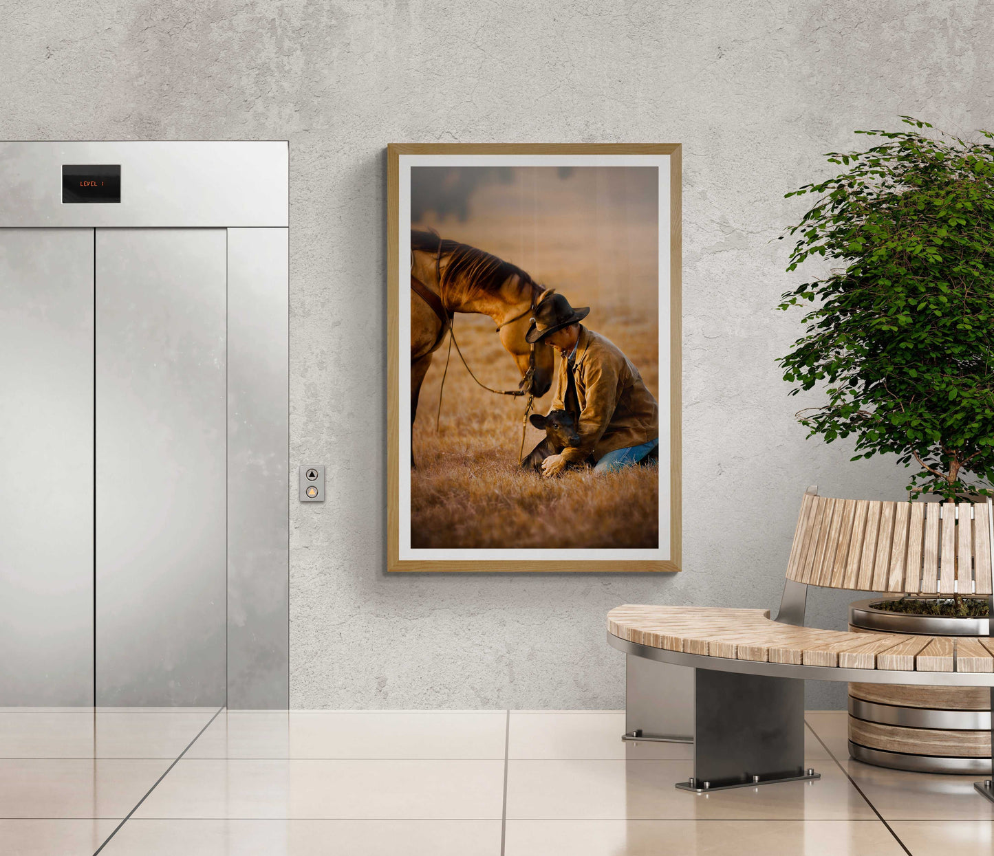Golden hour cowboy rescue artwork in a sleek hallway near an elevator, enhancing commercial or residential spaces with Western charm.