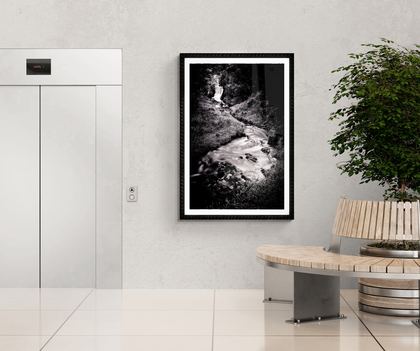 Black and white Scottish Highlands waterfall print showcased in a contemporary hallway near an elevator, enhancing minimalist decor with fine art.