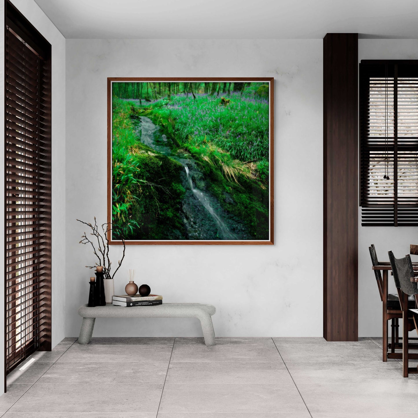 Lomond Creek fine art landscape print in a contemporary dining area, featuring a tranquil Scottish stream and bluebells in vivid green woodland.