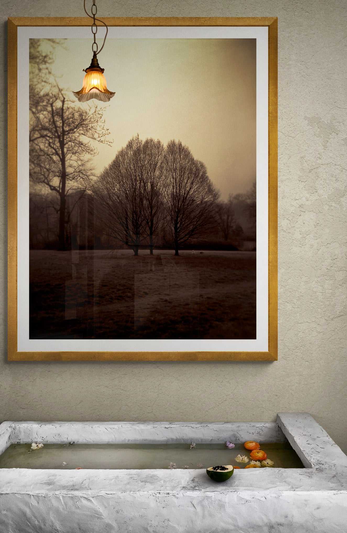 Hyde Park Meadow – Trees and Figures | Holga Film Print from London displayed in a spa-like bathroom, adding serene golden tones to a tranquil setting.