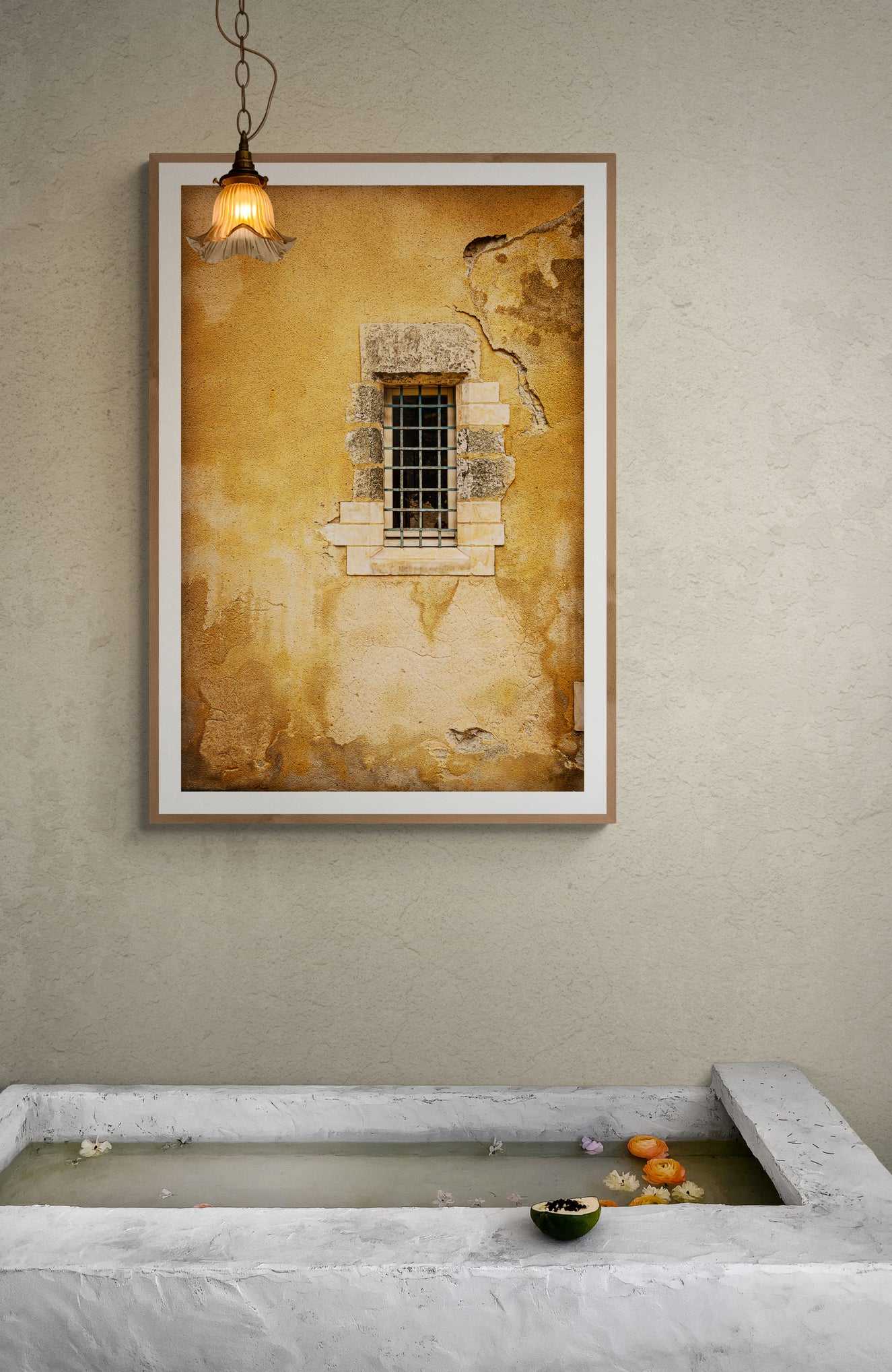 Golden Wall – Aged Texture and Light in Historic Troyes, France displayed above a stone bath, showcasing warm tones and textured wall art ideal for spa-inspired interiors.