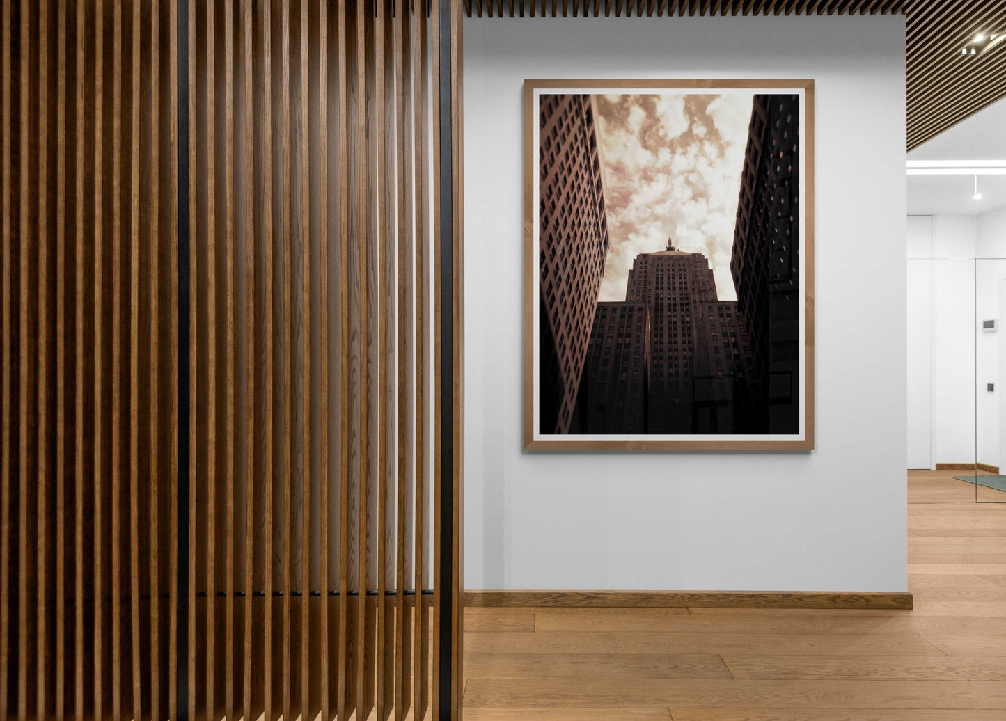 Board of Trade #1 – Sepia Holga photograph of Chicago Board of Trade framed in modern hallway, showcasing iconic Art Deco skyscraper.