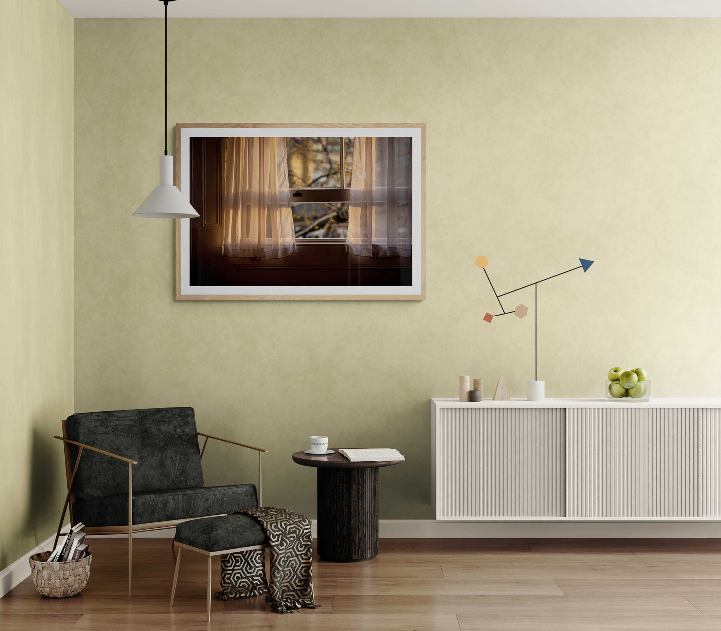 Award-winning photo print 'From A Window: Golden Light on Lace Curtains in a London Hotel Room' featured in a minimalist reading nook with green walls.