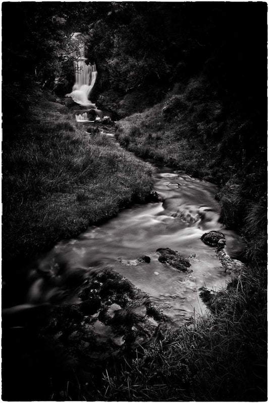 Silk and Stone, Sutherland - Scottish Highlands Waterfall Photo Print in black and white, featuring a serene long exposure of a cascading stream.